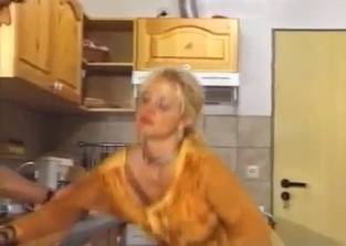 Submissive mommy fucked by her son in the kitchen